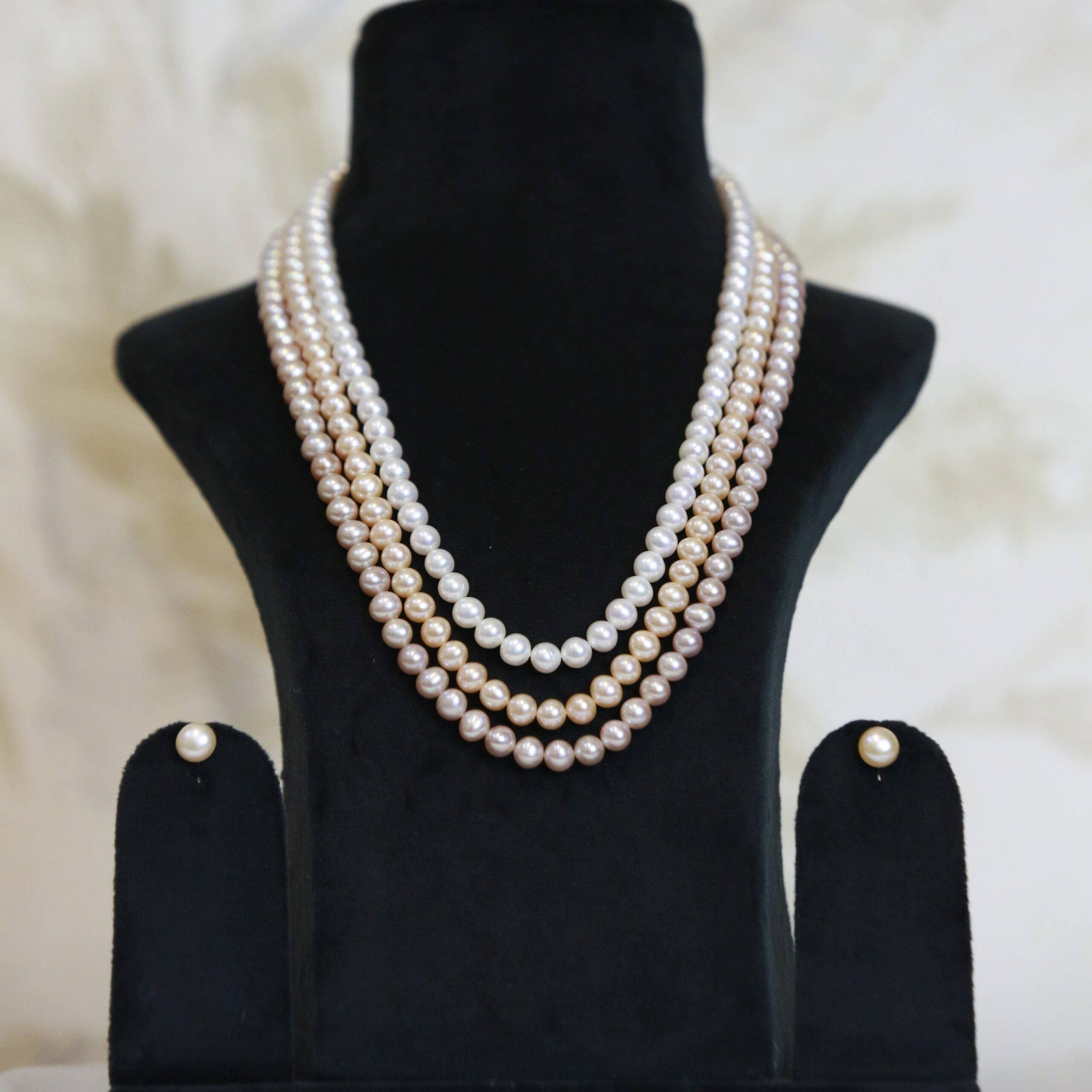 Gorgeous Three Line 20Inch Pearl Necklace With White Peach & Pink Round Pearls