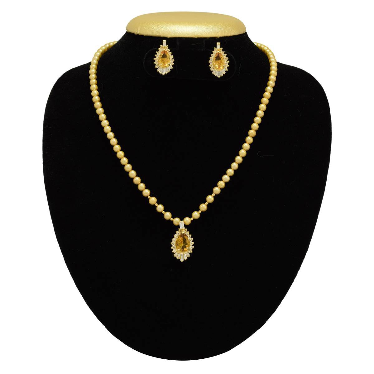 Pearl Necklace Set in Dark Golden Coloured Pearls and Topaz Like Stone Pendant