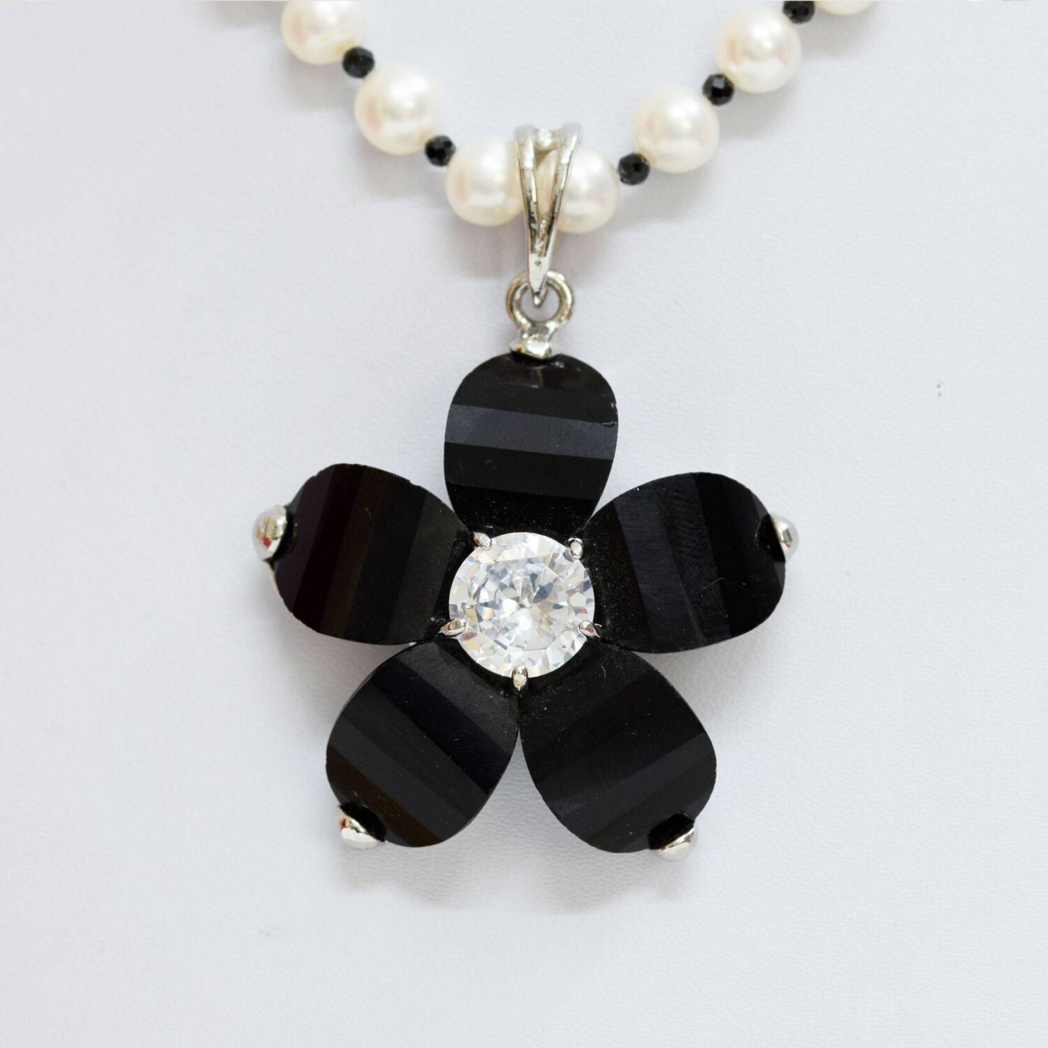 Simple yet Pretty Pearl Set in Black Stone Pendant - Image 2