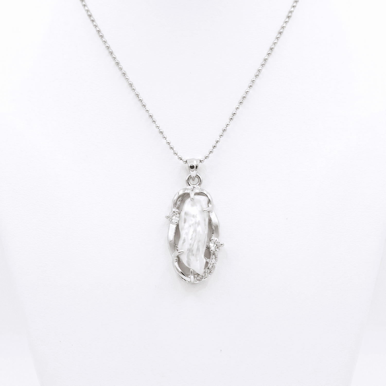 Artistic Silver Finish Pendant Accentuated With White Baroque Pearl & CZ