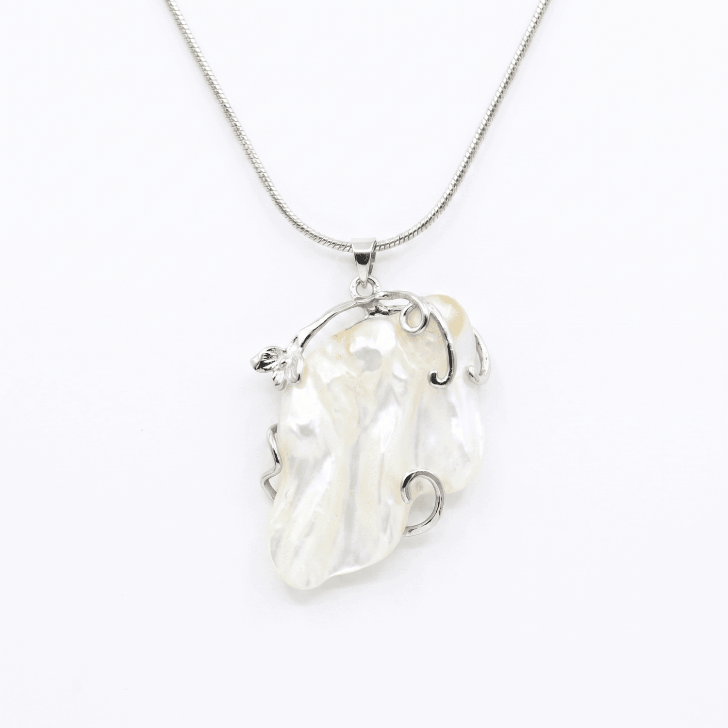 Exquisite Silver Finish Pendant Accentuated With Large White Baroque Pearl