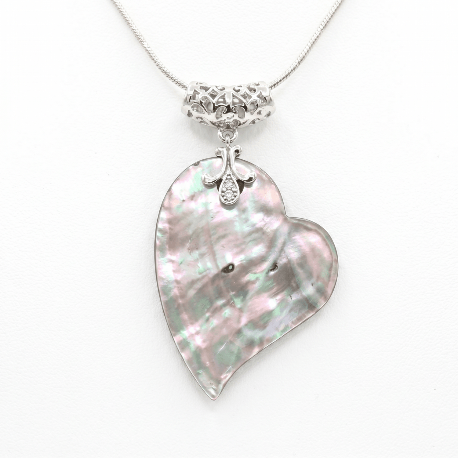 Unique Abalone Mother of Pearl Heart Shaped Pendant With A Filigree Clasp
