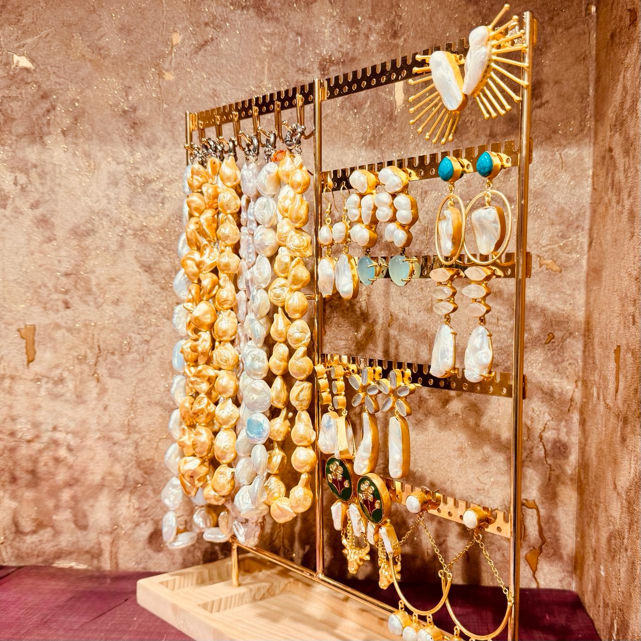 Pearl earrings and jewellery collection on display