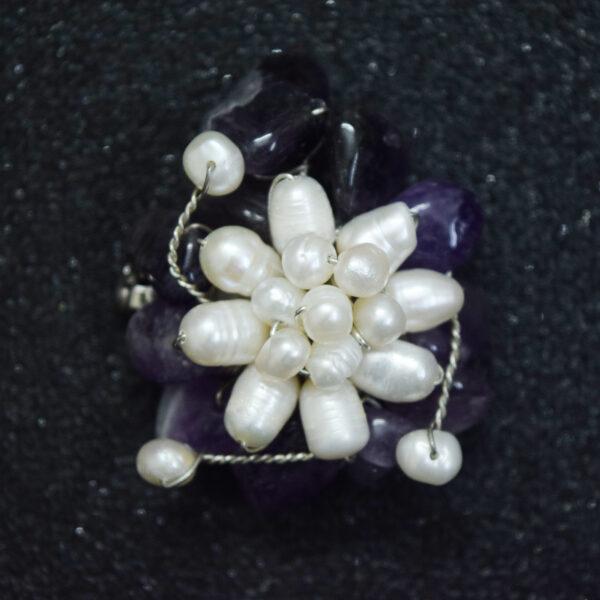 Different pearl saree pin or brooch with soft purple stones and oval pearls