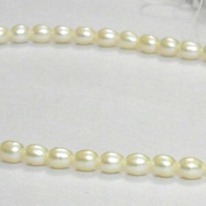 White oval medium pearl string