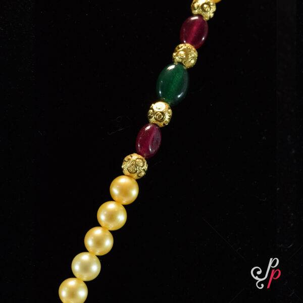 Rich Pearl Set in Golden Coloured Pearls and Baahubali Pendant