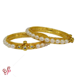 Adjustable Pearl bangles in white oval pearls and kundans