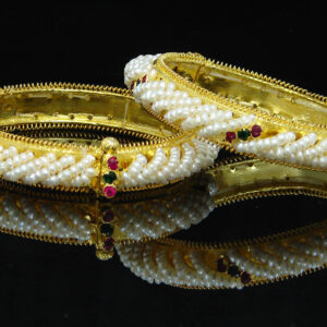 Beautiful, elegant seed pearl bangles in red and green stones