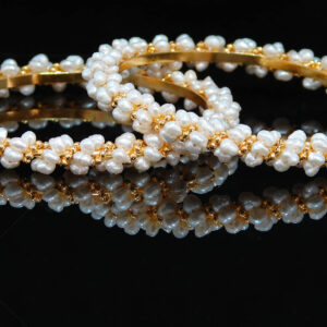 Cute pearl bangles in golden colour balls