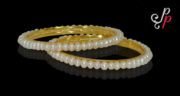 Just plain pearl bangles