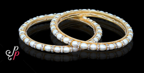 Medium oval pearl bangles with glittering american diamond pipes