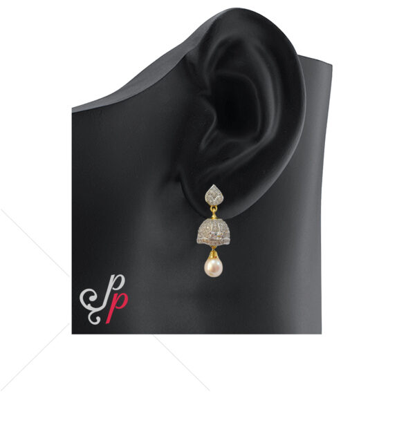 Pearl Jhumkas studded with American Diamonds