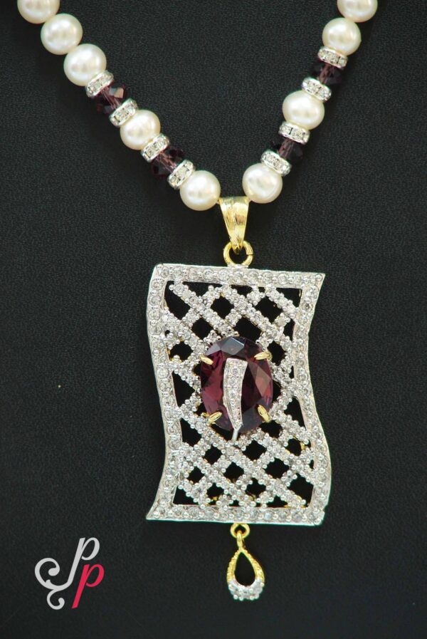 Pearl set in super stylish and different type of pendant with amethyst stone
