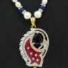 Pretty pearl necklace set in maroon meenakari and ink blue stone pendant