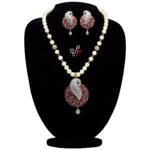 Rich Pearl Set in Highly Shiny Zircon and Ruby Studded Pendant