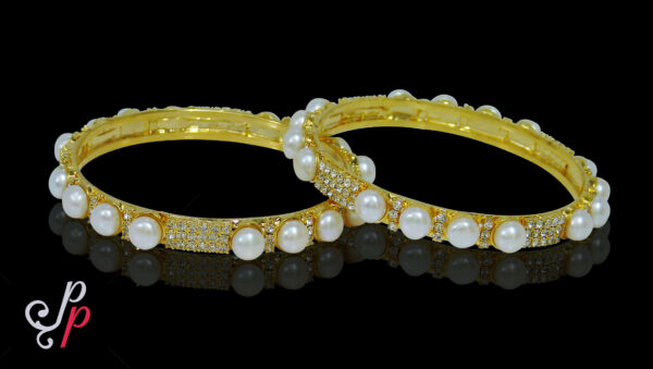 Simple pearl bangles with studded button pearls