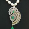 Stylish pearl necklace set in green kemp stones