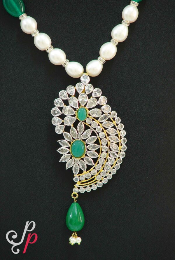 Stylish pearl necklace set in green kemp stones