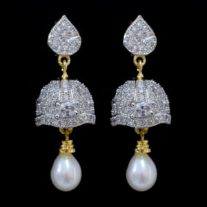 Pearl Jhumkas studded with American Diamonds