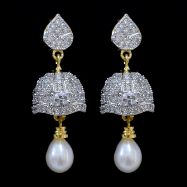 Pearl Jhumkas studded with American Diamonds