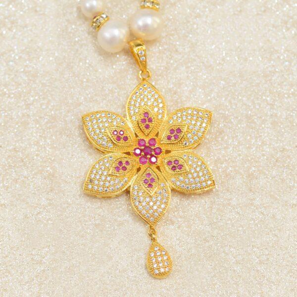 Pretty Pearl Necklace in Flower Shaped Golden Colour Pendant with rubies