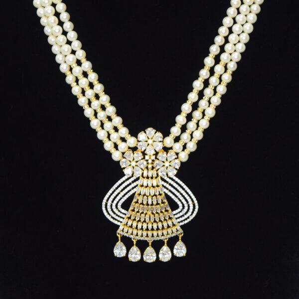 Classy 3 Lines Pearl Necklace with a Crystalline Pendant close up