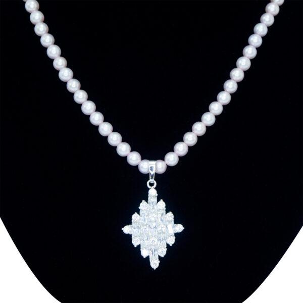 Princess-inspired elite light lavender pearl necklace set with diamond-shaped crystal-studded pendant close up