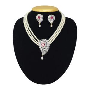 Three row white pearls necklace with a stylish pendant studded with semiprecious ruby and zircons