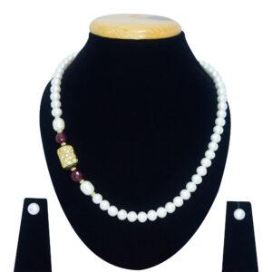 Well-crafted single-layer round white pearl necklace with jadau meenakari dholak bead pendant on the side with SP ruby beads