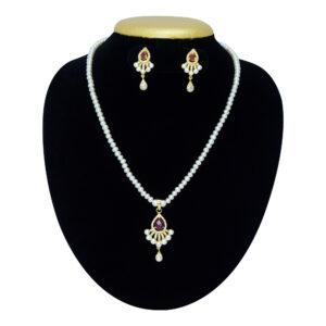 White pearls necklace with an opulent pendant studded with American diamonds & semi-precious ruby