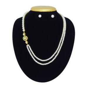 Splendidly crafted two-row white pearl necklace with a kundan brooch on the side