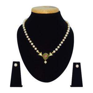 Well crafted single row round pink pearl necklace with ruby cz crystals & a striking black enamel finish kundan pendant