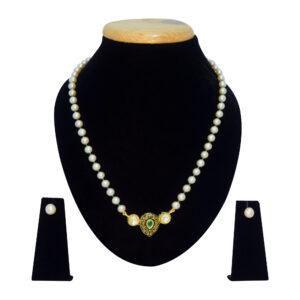 Well crafted single row round pink pearl necklace with emerald cz crystals & a regal black enamel finish kundan pendant