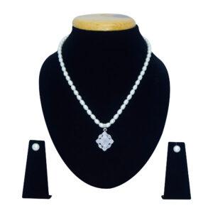 Well crafted white oval pearl necklace set with a subtle sandstone pendant