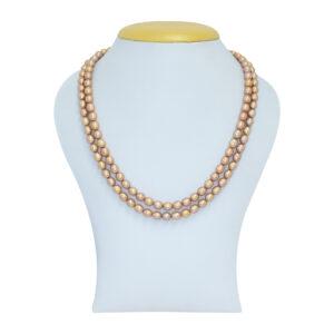 Splendidly crafted 20 Inches two-layer radiant antique gold oval pearl necklace.