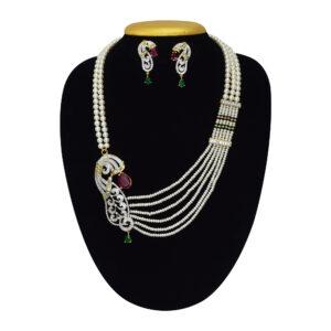 Remarkably well crafted multi-layer white pearl necklace set with a majestic zircon studded pendant on the side