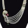 Remarkably well crafted multi-layer white pearl necklace set with a majestic zircon studded pendant on the side - close up