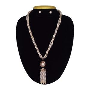 Elegantly crafted triple layer pink pearl necklace set with a rose gold finish zircon studded pendant with tassel pearls