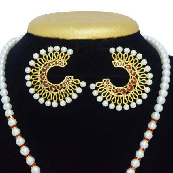Well crafted white round pearls with SP ruby roundels and a captivating faux pearl pendant with red enamel - earrings
