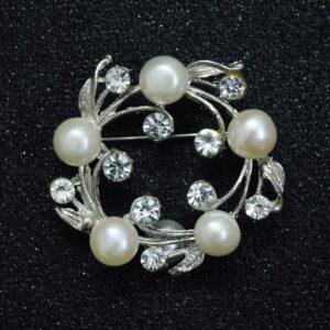 Ornate Floral Wreath Brooch With White Pearls & American Diamonds