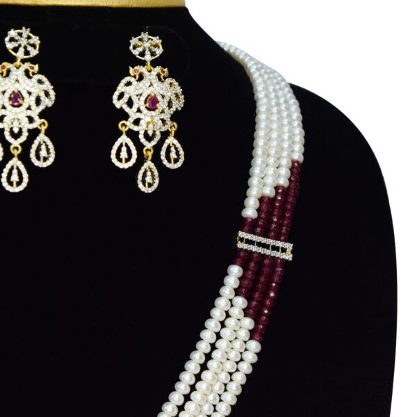 Multi-layer 5mm white semi-round pearl necklace with a majestic zircon studded peacock pendant featuring an SP ruby - closeup2