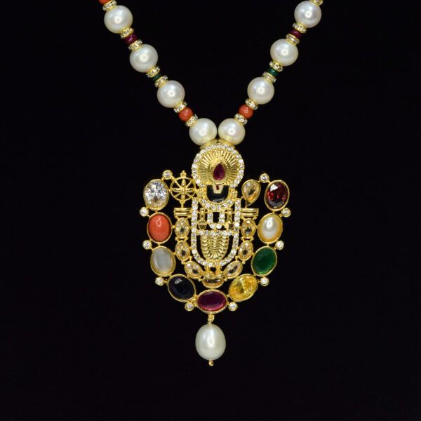 Glossy 7.5mm round white pearls necklace with an artistic and divine navaratna pendant featuring Lord Balaji - close up