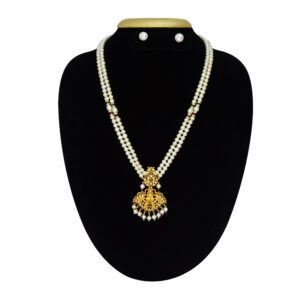 Two-row rich white round pearl long necklace with a traditional matt finish Lakshmi pendant studded with zircons, semi-precious Rsubies & Emerald