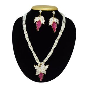 Splendid white rice pearls multistrand necklace studded with SP ruby beads attached to a gorgeous leafy zircon & sp ruby pendant