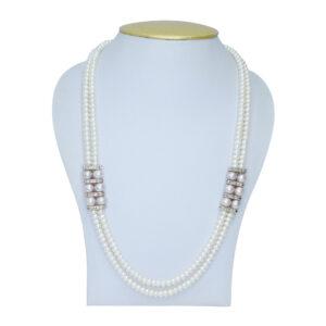 Elegantly crafted dual-layer white semi-round pearls and pink pearls & AD spacers as side brooches