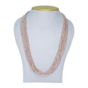 Stunning 15 strands of peach rice pearls finely crafted to a long 20-inch necklace