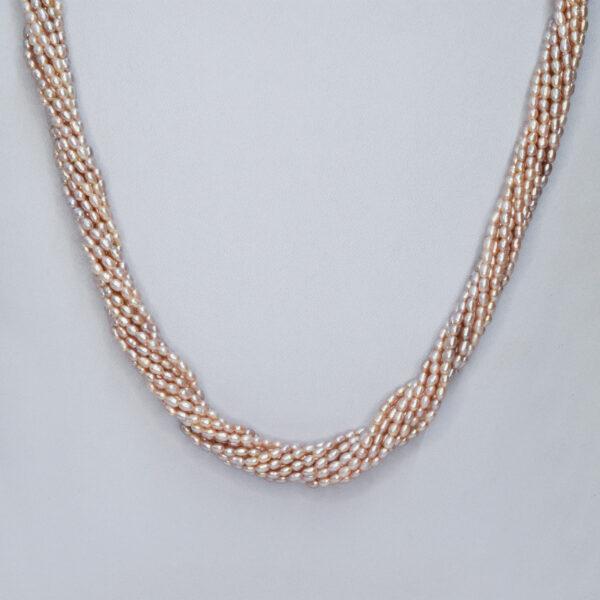 Stunning 15 strands of peach rice pearls finely crafted to a long 20-inch necklace - twisted close up