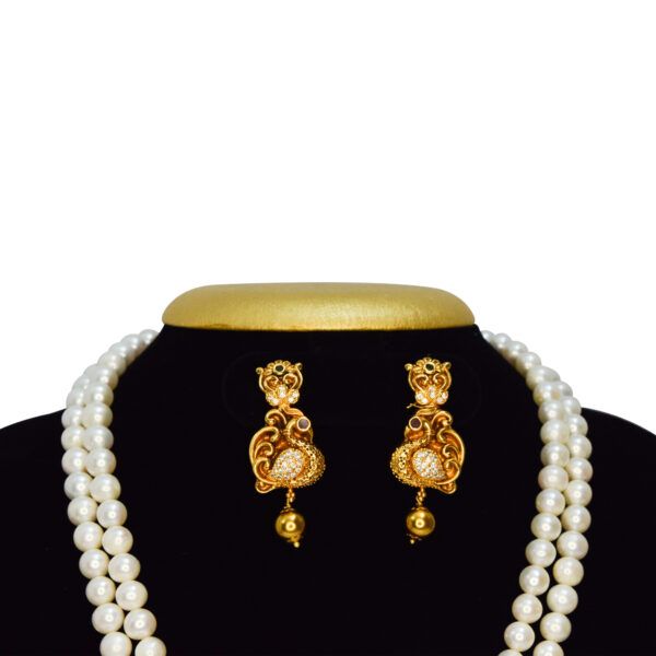 Marvellous Two-row White Pearls Mala With Lord Ganesha Pendant -earrings