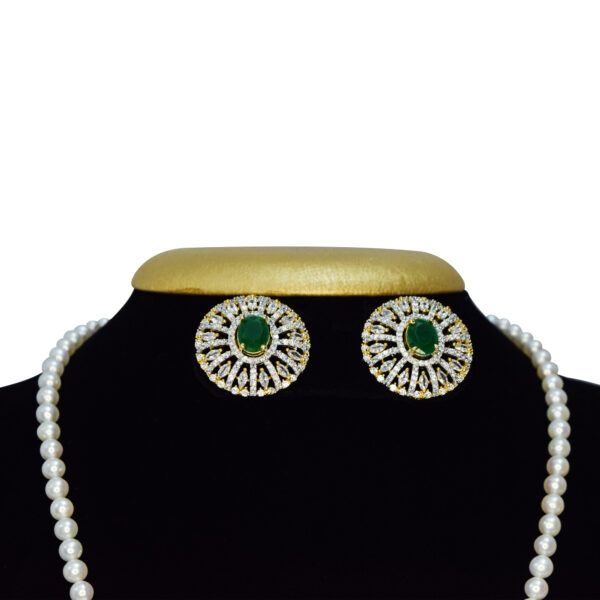 Bright 5mm round white pearls necklace with an artistic CZ studded peacock pendant with SP Emerald in the centre - close up1