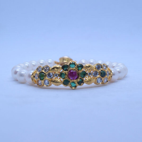Timeless White Pearls Kada With Green Kemp Stones Clasp -front